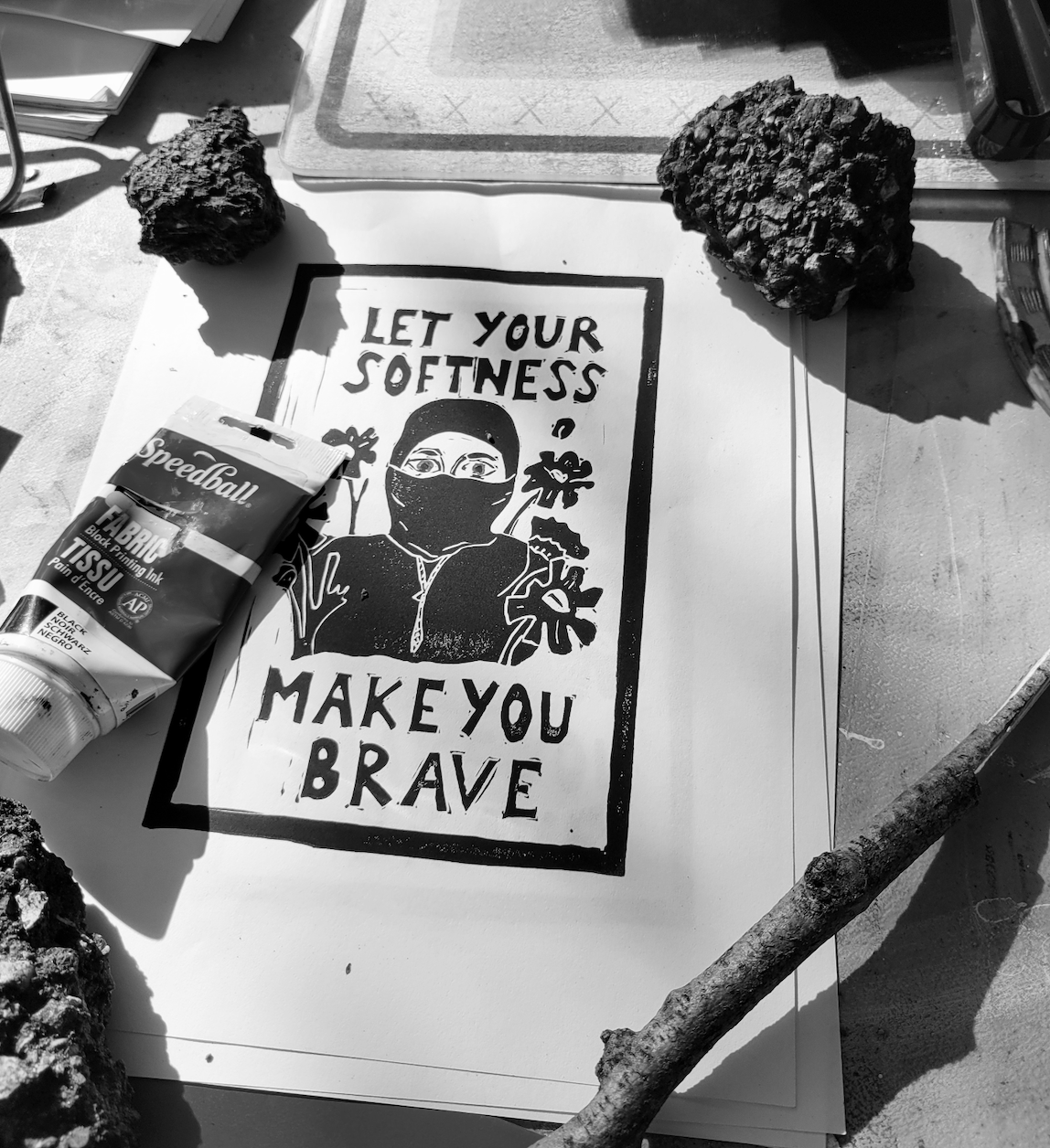 screenprinting template with a person wearing a black mask, featuring the words Let Your Softness Make You Brave